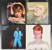 Four David Bowie LPs comprising Young Americans, Hunky Dory (Dynaflex) with lyric sheet, Aladdin