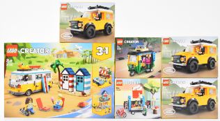 Six Lego Creator sets comprising three Land Rover Classic 40650, Coffee Cart 40488, Tuk Tuk 40469