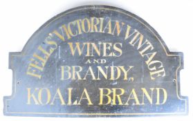 Fells' Victorian Koala Brand Wines and Brandy shaped wooden advertising sign with gold lettering