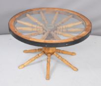 Metal bound cartwheel table with glass top, diameter 74 x height 43cm