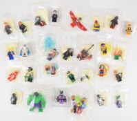 Twenty-seven Lego Marvel and DC minifigures comprising Hulk, Nick Fury, Aquaman, Sinestro,