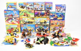 A collection of 1980s and 90s Lego kits to include Pirates and Space themes, some in original