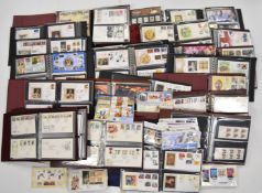 A very large collection of GB first day covers and coin covers in albums and loose, many of them
