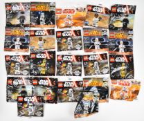 Twenty-two Lego Star Wars minifigure packs to include C-3PO (red arm), First Order Stormtrooper,