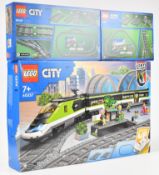 Lego City Express Passenger Train set, 60337, 2022, together with additional track sets 60205 and