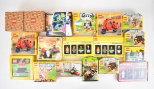 A collection of Lego minifigure sets including website exclusives, all in original boxes.