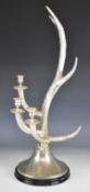 Bookworks figural deer antler three branch candelabra, H66cm
