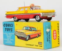 Corgi Toys diecast model Chevrolet Taxi Cab with yellow/red body, silver trim, aerial and rates