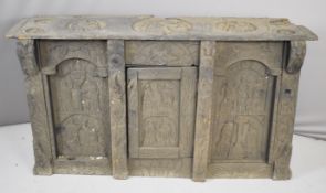 17th / 18thC carved oak three door cabinet with religious iconography, possibly much older than