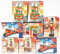 Eight Lego Christmas sets comprising two Train 40138, two Carousel 40293, two Snow Globe 40223, Gift