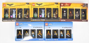 Five Lego minifigure boxed sets comprising Lego City, The Batman Movie and Marvel Super Heroes,
