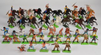 Forty Britains Deetail plastic toy soldiers on metal bases comprising Cowboys & Indians, together