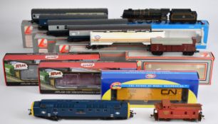 A collection of 00/H0 gauge model railway locomotives and rolling stock to include Lima, Airfix,
