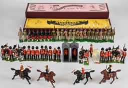 Fifty Britains painted metal toy soldiers to include Scots Guard, Lancers and a Sikh regiment.