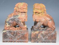 Pair of carved soapstone Dog of Fo figures, H16cm