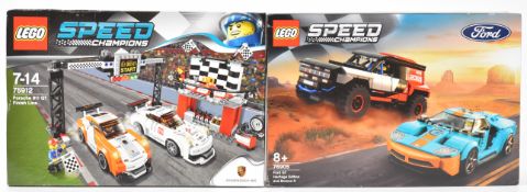 Two Lego Speed Champions racing car sets comprising Porsche 911 GT Finish Line 75912 and Ford GT