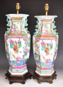Pair of Chinese famille verte vases drilled for lamps, with figural decoration, height excluding