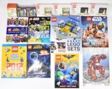 A collection of Lego related books and ephemera to include website exclusives