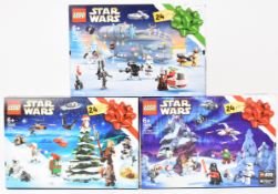 Three Lego Star Wars Christmas Advent calendars comprising set numbers 75307, 75245 and 75279, in
