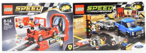 Two Lego Speed Champions racing car sets comprising Ferrari FXX K & Development Center 75882 and