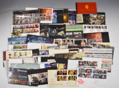 A collection of GB presentation packs, first day covers and prestige booklets, high face value