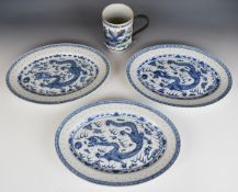 19thC Chinese porcelain tankard and four contemporary oval plates decorated with dragons, tallest