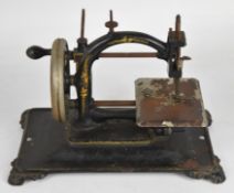 Vintage 19thC or early 20thC Original Express sewing machine, with original instructions and