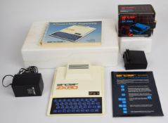 Sinclair Spectrum ZX80 computer with 16K ram cartridge, both in original packaging.