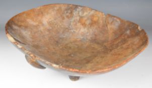 19th century likely Swazi African tribal carved bowl with feet and suspension loop to underside,