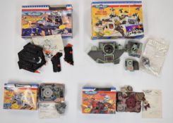 Four Micro Machines playsets by Galoob, in original boxes.