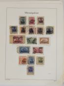 Memel stamp collection on album pages in a white folder