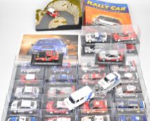 Twenty-nine DeAgostini 'Rally Car Collection' diecast model cars with the majority in Perspex