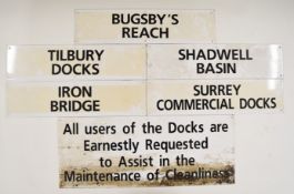 Collection of enamel signage including a large notice for St Katharine Docks stating it is free from