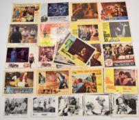 A collection of vintage cinema lobby card sets, promotional stills and front of house posters to