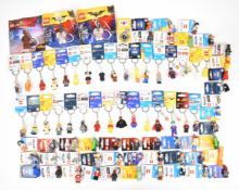 Approximately eighty Lego keyrings to include Star Wars, Marvel, DC, Harry Potter, Sesame Street,