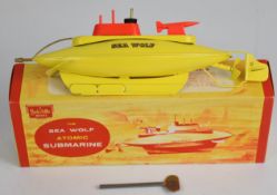 Sutcliffe Models tinplate clockwork Sea Wolf Atomic Submarine, in original box with key.