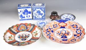 Chinese / Japanese ceramics including two Imari chargers, Chinese pillows etc, largest diameter