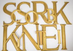 Fourteen shop fitting / advertising gilt painted wooden letters, largest 39 x 25cm