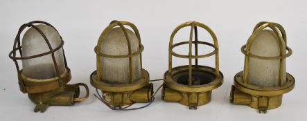 Four brass ship's / nautical caged bulkhead electric lights, H19cm