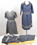 Two Victorian / Edwardian swimsuits / beach dresses, one with piped and embroidered decoration