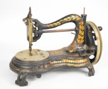 Eclipse hand cranked sewing machine, raised on scrolling feet