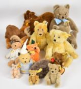 Fourteen modern Steiff Teddy bears and animals, each with original yellow tags and button in ear,