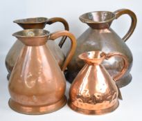 Four graduated copper measuring jugs 1-4 gallons, one with maker's mark for Arrow & Jackson, London,