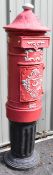 Two cast iron post boxes, one yellow, one red, possibly Irish, height of tallest 164cm
