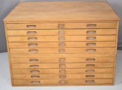 19th / 20thC ash two section plan chest with ten straight drawers, recessed handles and apertures to