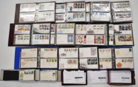 A large comprehensive GB first day cover collection, in thirteen albums and two shoeboxes to year