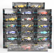 Twenty-three Onyx diecast model Formula 1 cars, in original Perspex display boxes.