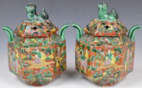 Pair of 19th / 20thC Chinese twin handled fluted covered censers with Dog of Fo finials and