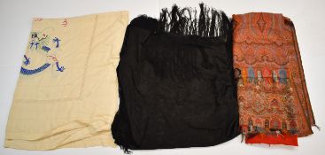 Two Chinese embroidered piano shawls, one with dragon decoration, and a large paisley bed cover,