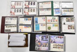 GB first day cover collection in seven albums and a small box of examples still in their Royal